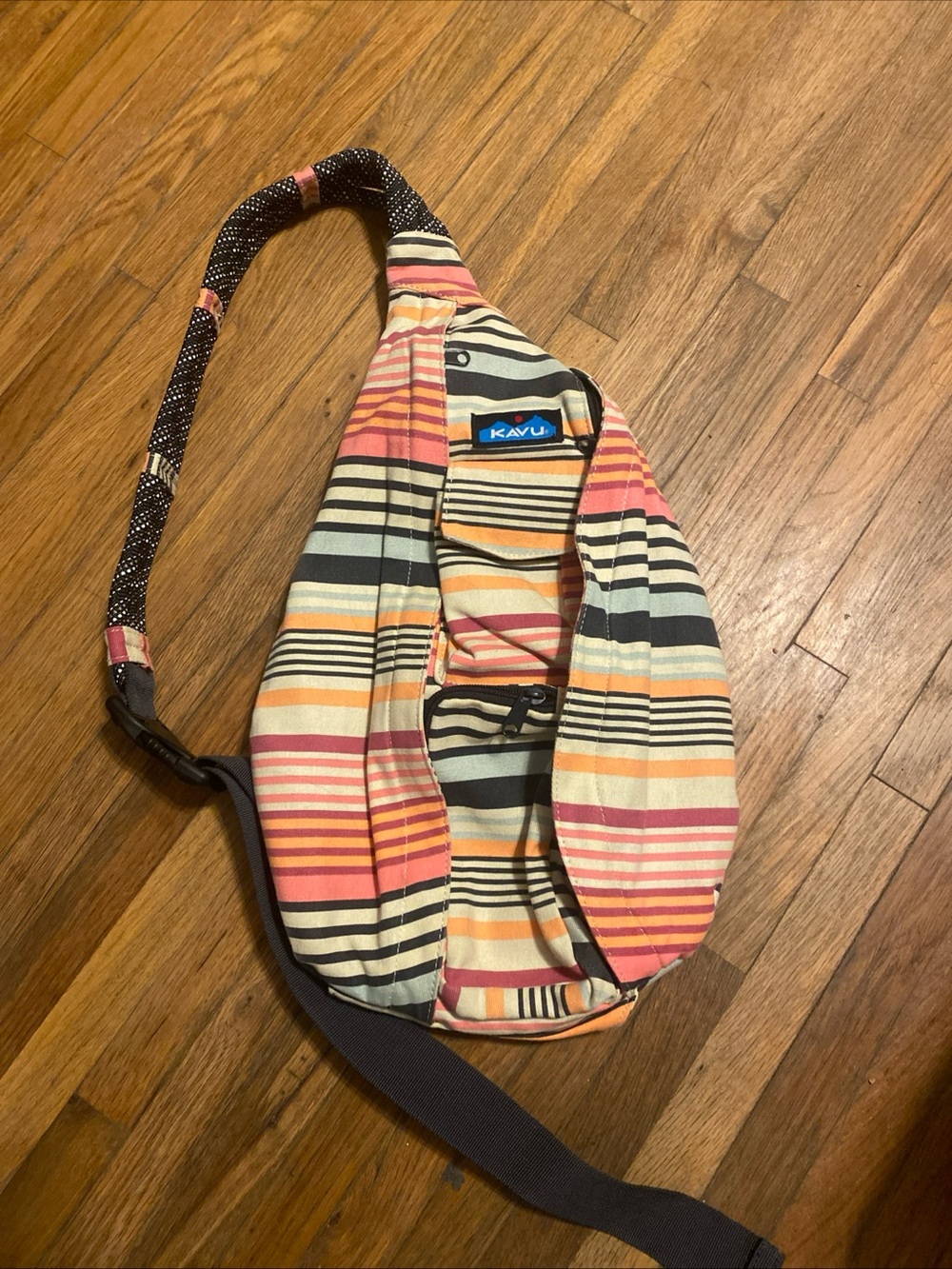 Kavu Striped Crossbody Sling Bag in Pink, Orange, Cream, Black
